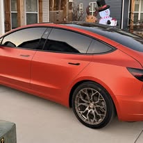 Tesla Model 3 — Rear 3/4 — Satin Red Metallic